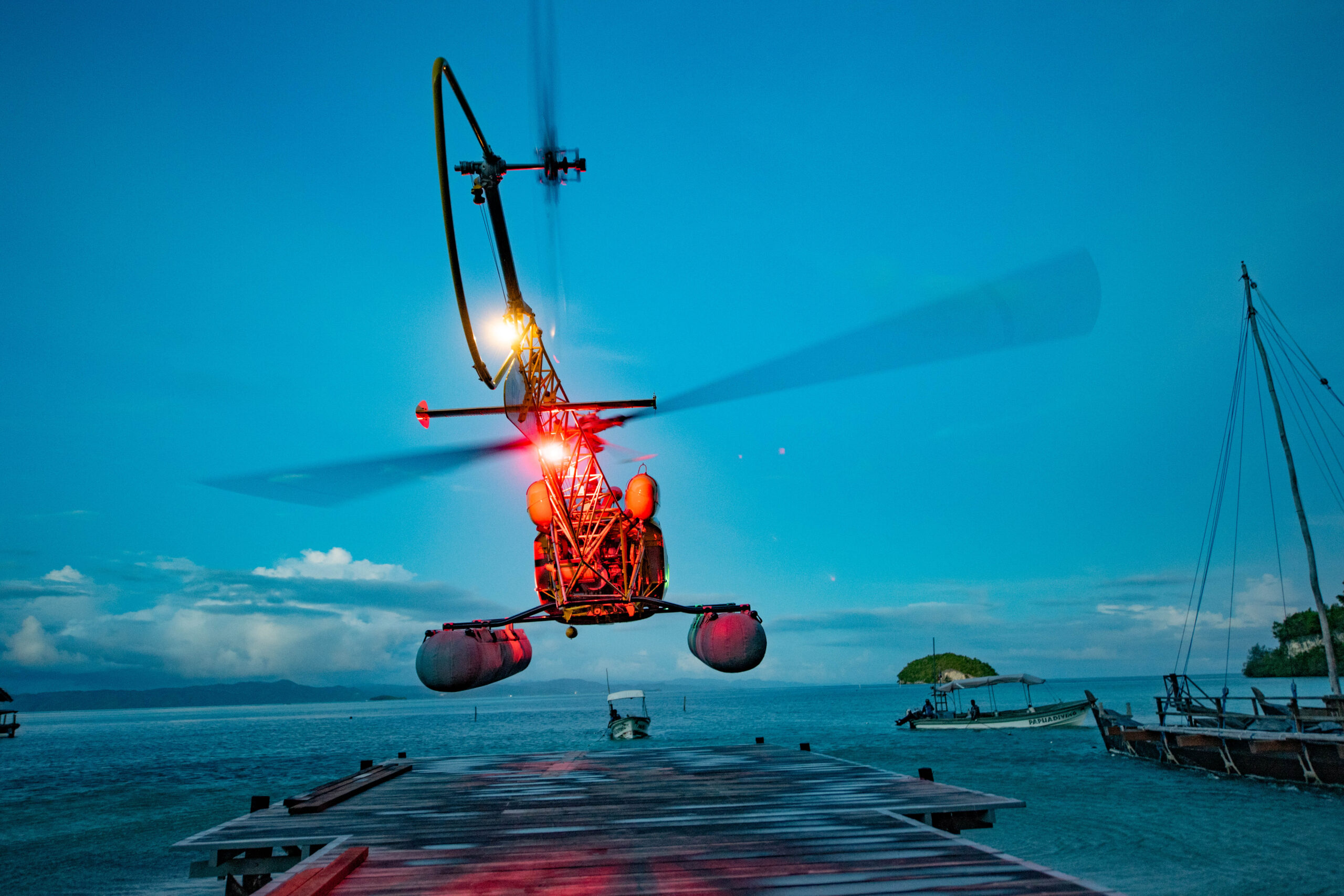 a helicopter (which Max Ammer, founder of Papua Diving Resorts, built himself)