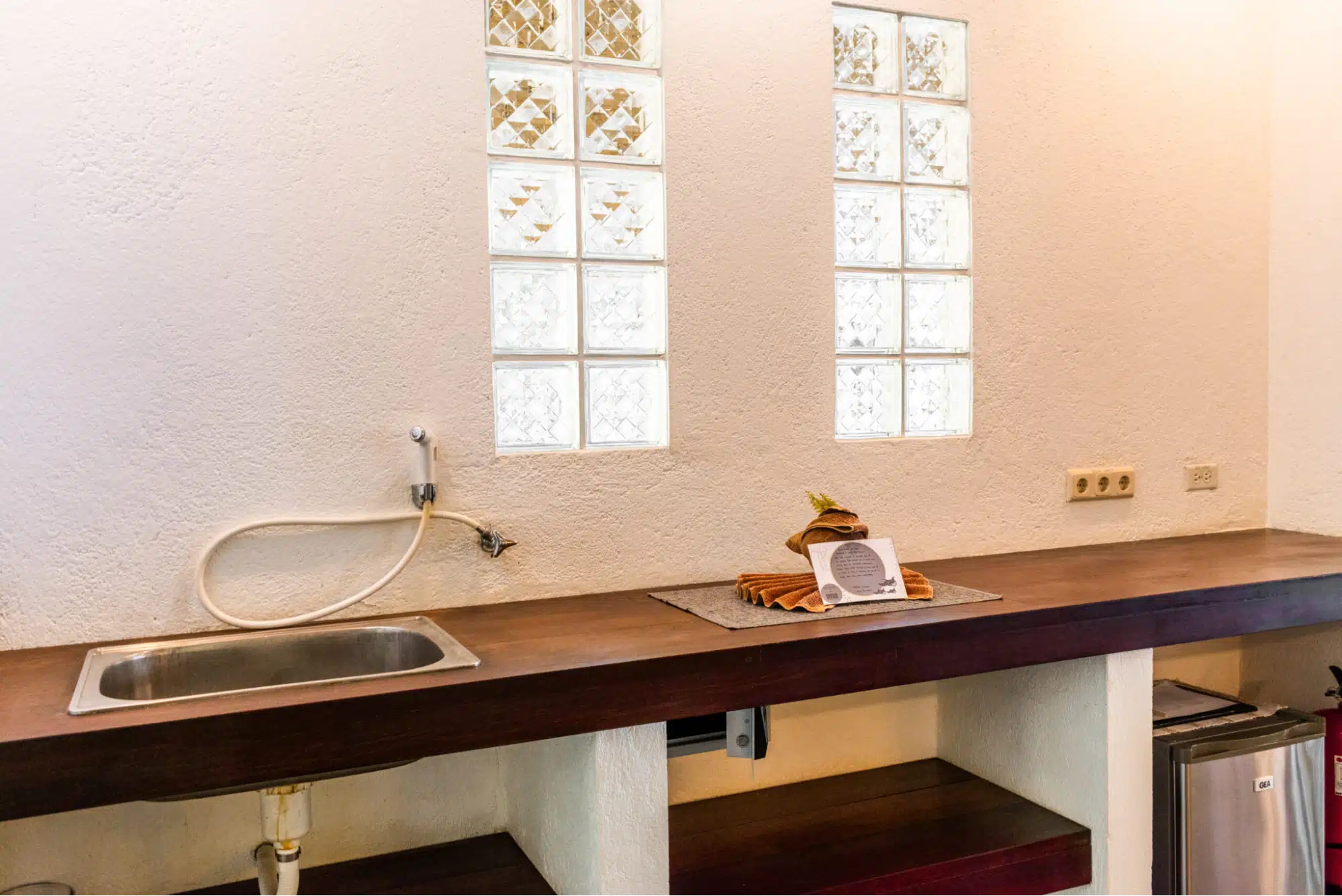 In-room camera workstation at Sorido Bay Resort, designed for underwater photographers in Raja Ampat