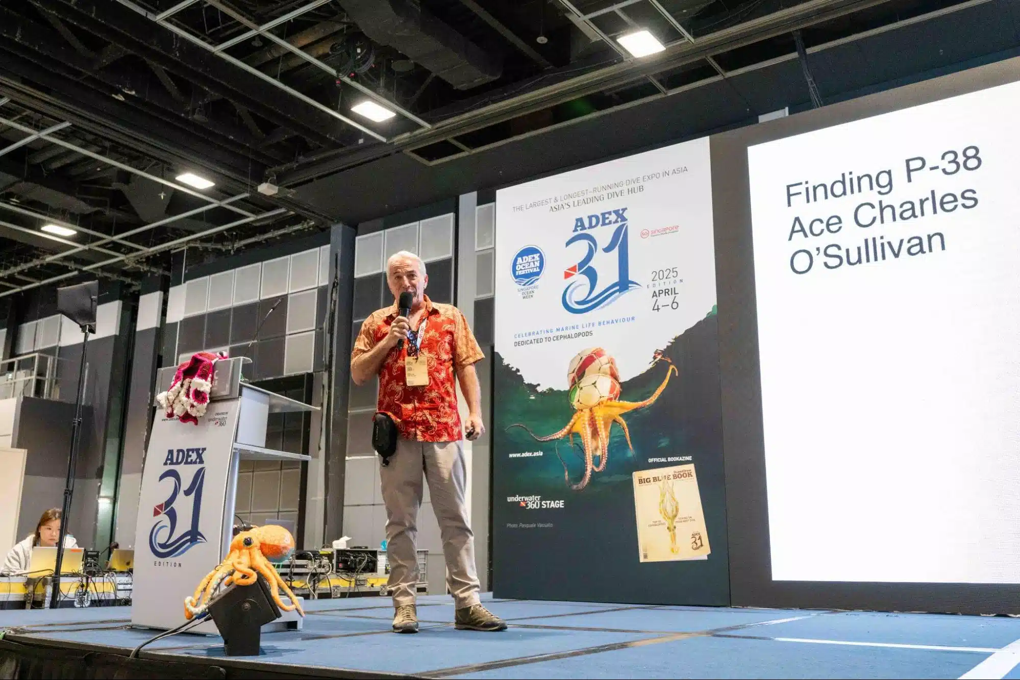 Max Ammer, founder of Papua Diving Resorts, speaking at ADEX Singapore 2025 about sustainable resort practices in Raja Ampat