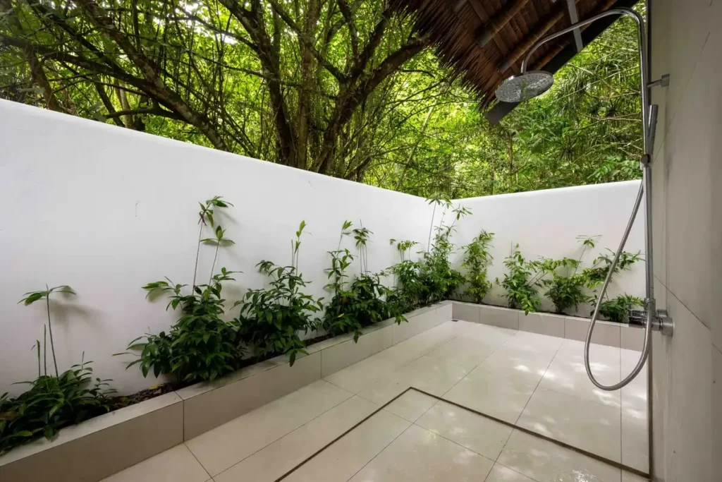 Its outdoor shower connects directly to the indoor bathroom - Sorido Bay Resort